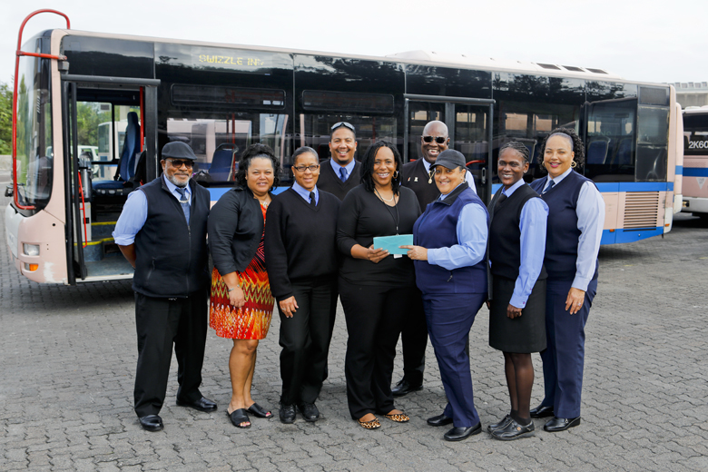 DPT Staff Present Family of Former Colleague with Cheque to Offset Medical Costs