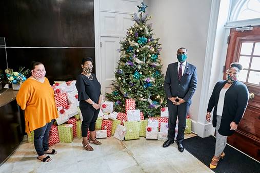 Premier gives toys to children
