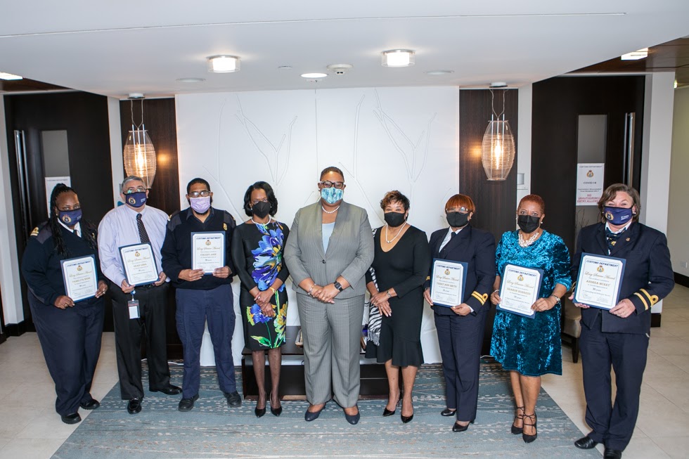 Minister Ming Salutes Long Serving Customs Officers