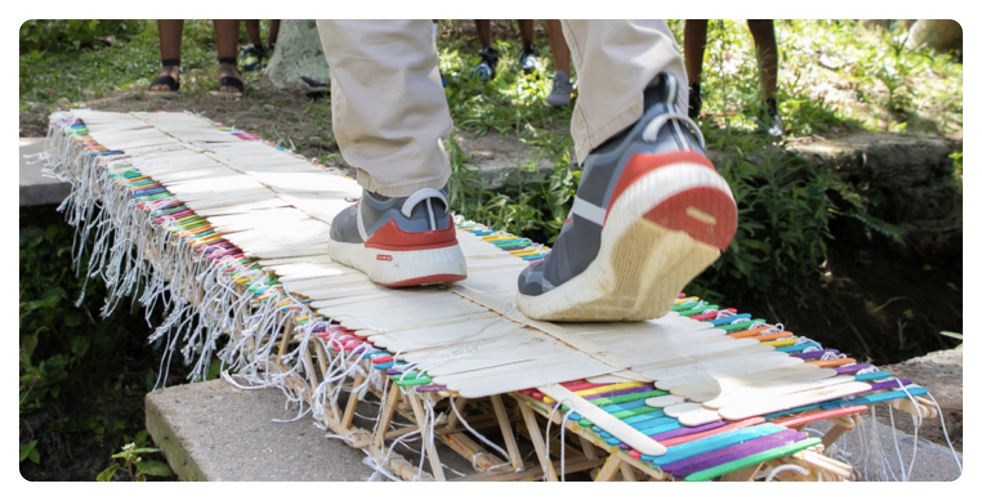 The Minister of Education successfully crossed the Popsicle Bridge built by Students of the 2022 STEAM Academy