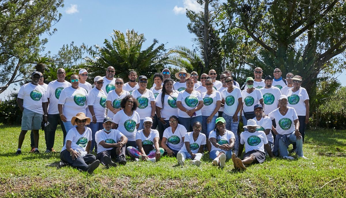 Post Office team cleans up Botanical Gardens for World Post Day