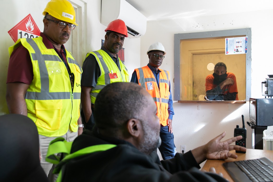 Minister Weeks Tours Hamilton Docks