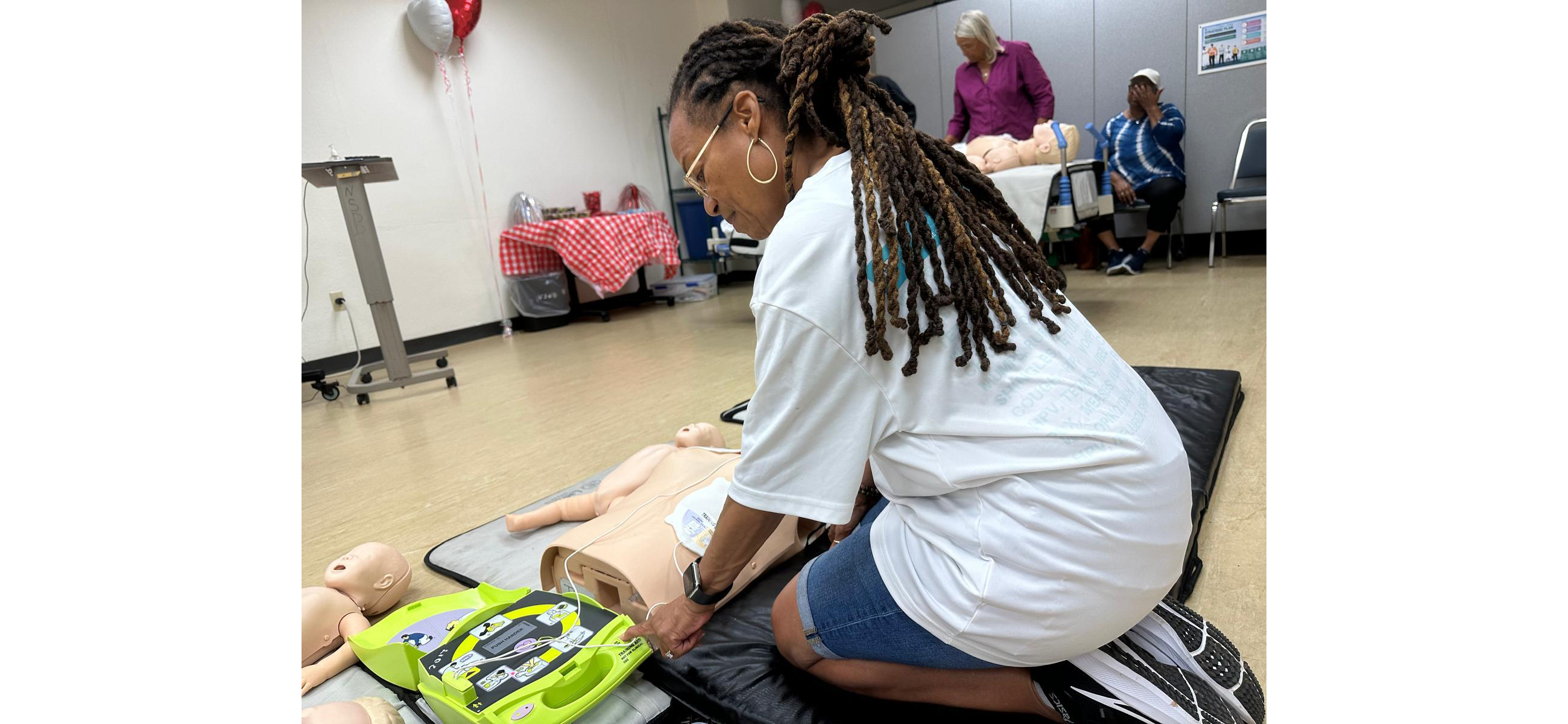 Minister Wilson and her daughter participate in CPR AED training